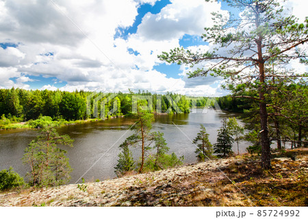 Summer landscape of Kymijoki river waters in Finland. 85724992