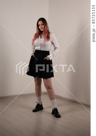 Plump teen girl posing in school uniform 85725155
