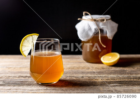 Raw fermented homemade alcoholic or non alcogolic kombucha superfood. Ice tea with healthy natural probiotic 85726090