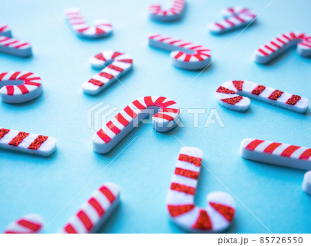 Christmas pattern with candies on blue background Christmas pattern with candies on blue background 85726550
