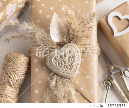 Valentines present decorated with heart and pampass grass top view 85726573