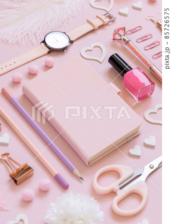 Hardcover notebook,  school girly accessories and hearts on pastel pink close up, mockup 85726575
