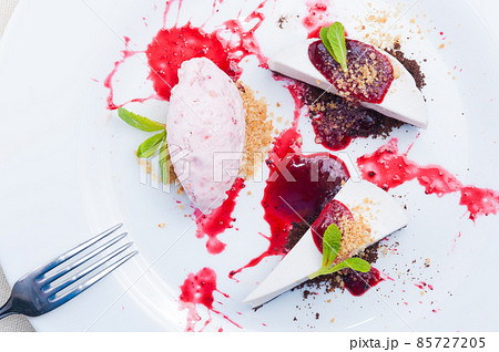 lavender cheesecake with strawberry and hibiscus ice cream. top view lavender cheesecake with strawberry and hibiscus ice cream. top view 85727205