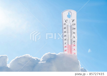 The thermometer lies on the snow in winter showing a negative temperature.Meteorological conditions in a harsh climate in winter with low air and ambient temperatures.Freeze in wintertime.Sunny winter The thermometer lies on the snow in winter showing a negative temperature.Meteorological conditions in a harsh climate in winter with low air and ambient temperatures.Freeze in wintertime.Sunny winter 85727435