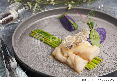 white fish with green asparagus. Concept white fish with green asparagus. Concept 85727725