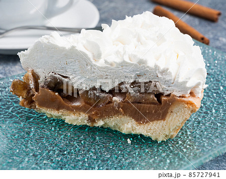 slice of banana-caramel pie with sour cream 85727941