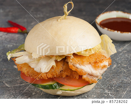 chicken Burger with Bao bun with sauce. Asian cuisine 85728202