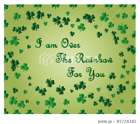 Saint Patrick's Day greeting card with sparkled green clover leaves and text. Inscription - I am Over The Rainbow For You 85728382