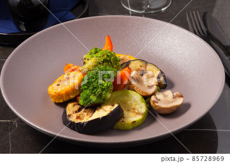 tasty grilled vegetables and mushrooms. Vegetarian food 85728969
