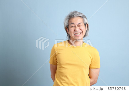 Asian Man with Yellow Tshirt 85730748