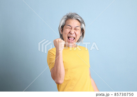 Asian Man with Yellow Tshirt 85730750