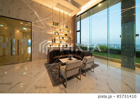 Inside of modern hotel lobby, entrance and reception, interior architecture design decoration, waiting area with urban city view of outdoor, indoor. Inside of modern hotel lobby, entrance and reception, interior architecture design decoration, waiting area with urban city view of outdoor, indoor. 85731410
