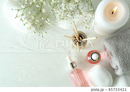 Aromatic concept with diffuser on white wooden table Aromatic concept with diffuser on white wooden table 85733421