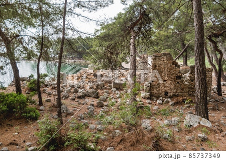 Northern Harbour of ancient city Phaselis. Ruins of Greek city on coast of ancient Lycia. Architectural landmark in Turkey. 85737349