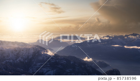 Aerial Panoramic View of Canadian Mountain covered in snow. Aerial Panoramic View of Canadian Mountain covered in snow. 85738596