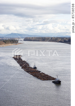 Aerial View of Tugboat in Fraser River and Mountain Landscape Aerial View of Tugboat in Fraser River and Mountain Landscape 85738598
