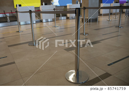 Fence rack with pulling tape at the airport. 85741759