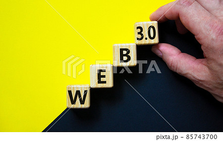 WEB 3.0 symbol. Wooden cubes with concept words WEB 3.0. Beautiful yellow and black background, copy space. Businessman hand. Business, technology web3 and WEB 3.0 concept. WEB 3.0 symbol. Wooden cubes with concept words WEB 3.0. Beautiful yellow and black background, copy space. Businessman hand. Business, technology web3 and WEB 3.0 concept. 85743700
