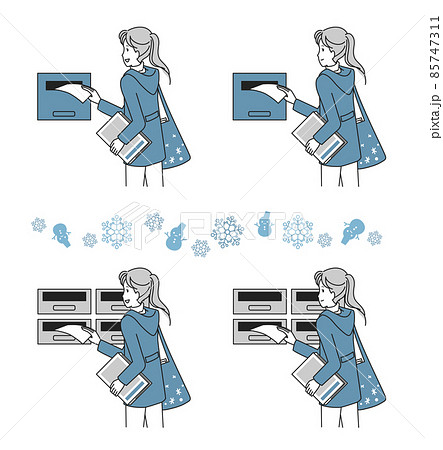 ポスティングをする若い女性　冬 85747311