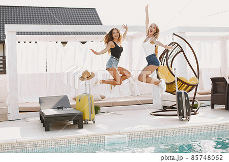 Women at the vacations in a summer Women at the vacations in a summer 85748062