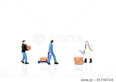 Spraying disinfectant to box 85748728