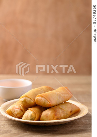 Asian deep fried spring roll filling with tofu, cabbage, carrot and glass noodle Asian deep fried spring roll filling with tofu, cabbage, carrot and glass noodle 85749260