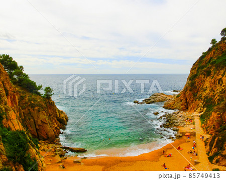 View through walls of ancient fortress in Tossa de mar. Costa Brava, Spain View through walls of ancient fortress in Tossa de mar. Costa Brava, Spain 85749413