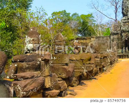 Giants in Front Gate of Angkor Thom Giants in Front Gate of Angkor Thom 85749756