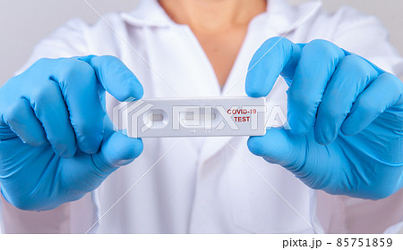 Doctor showing rapid laboratory COVID-19 antigen rapid test for diagnosis new Corona virus infection or covid-19 Pandemic infectious concept Doctor showing rapid laboratory COVID-19 antigen rapid test for diagnosis new Corona virus infection or covid-19 Pandemic infectious concept 85751859