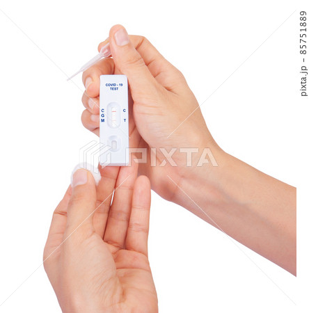 Women hands show Antigen Test kits for people to self-test for Covid-19 at home , Home isolate quarantine concept 85751889