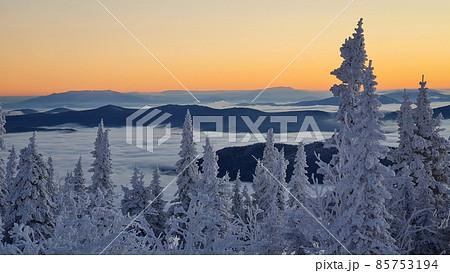 Majestic sunset in the winter mountains landscape. Dramatic sky 85753194