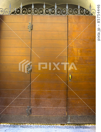 An old entrance door in Salzburg, Austria. An old entrance door in Salzburg, Austria. 85754446