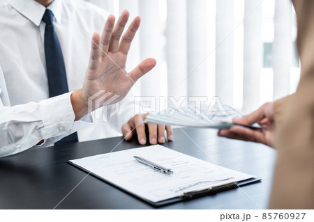 Businessman is refuses to accept banknote money and terms of contract from bribe employer in signing contract while making corruption about buy land and real estate 85760927