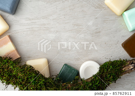 Natural handmade soap and plants on gray background 85762911
