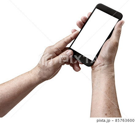 Senior woman hands holding black smartphone isolate with clipping mask on white background Senior woman hands holding black smartphone isolate with clipping mask on white background 85763600