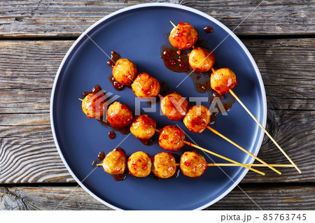 Luk Chin Ping, thai meatball skewers, top view Luk Chin Ping, thai meatball skewers, top view 85763745