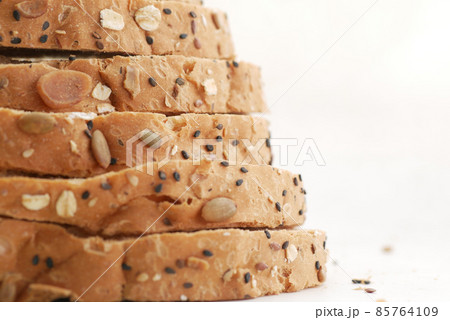 detail shot of whole grain baked bread on table  85764109