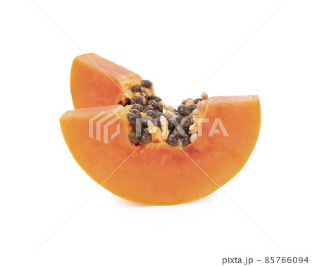 Fresh ripe papaya slices on white background Fresh ripe papaya slices on white background 85766094