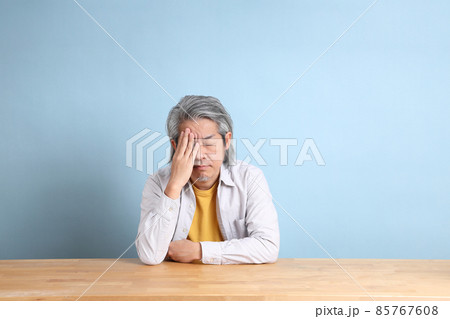 At the Desk At the Desk 85767608
