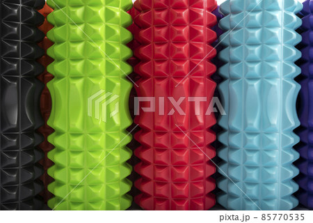 Close-up multicolored massage rollers for body massage. Foam myofascial rollers for physiotherapy. Top view 85770535