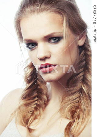young pretty blond girl with hairstyle and make up posing happy smiling on white background isolated, lifestyle people concept young pretty blond girl with hairstyle and make up posing happy smiling on white background isolated, lifestyle people concept 85773835