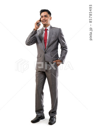 asian young businessman using mobile smartphone on white asian young businessman using mobile smartphone on white 85785493