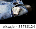 100 usd banknotes visible in the pocket of a jeans lying on the floor, your jeans and 100 usd, 85786124