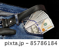100 usd banknotes visible in the pocket of a jeans lying on the floor, your jeans and 100 usd, 85786184
