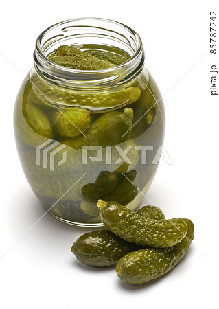 Tasty canned Whole green cornichon in a can isolated on a white background Tasty canned Whole green cornichon in a can isolated on a white background 85787242