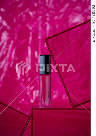 Hot pink nail polish on bright pink background 85788992