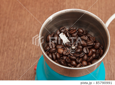 coffee beans in an electric coffee grinder coffee beans in an electric coffee grinder 85790991
