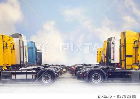 Trucks parked beautifully with sky background and copy space Trucks parked beautifully with sky background and copy space 85792889