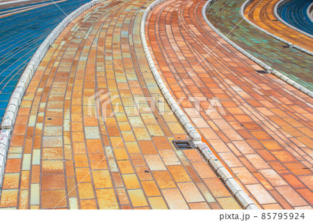 Beautiful whimsical colorful pavement tile blocks in Italy Beautiful whimsical colorful pavement tile blocks in Italy 85795924