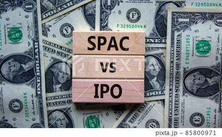 SPAC vs IPO symbol. Blocks with words 'SPAC, special purpose acquisition company' and 'IPO, initial public offering' on background from dollar bills, copy space. Business and SPAC vs IPO concept. SPAC vs IPO symbol. Blocks with words 'SPAC, special purpose acquisition company' and 'IPO, initial public offering' on background from dollar bills, copy space. Business and SPAC vs IPO concept. 85800971